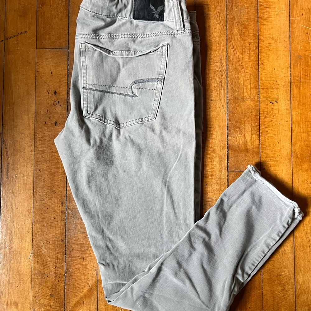 Size 8 greyish 360 degree stretch jeans
